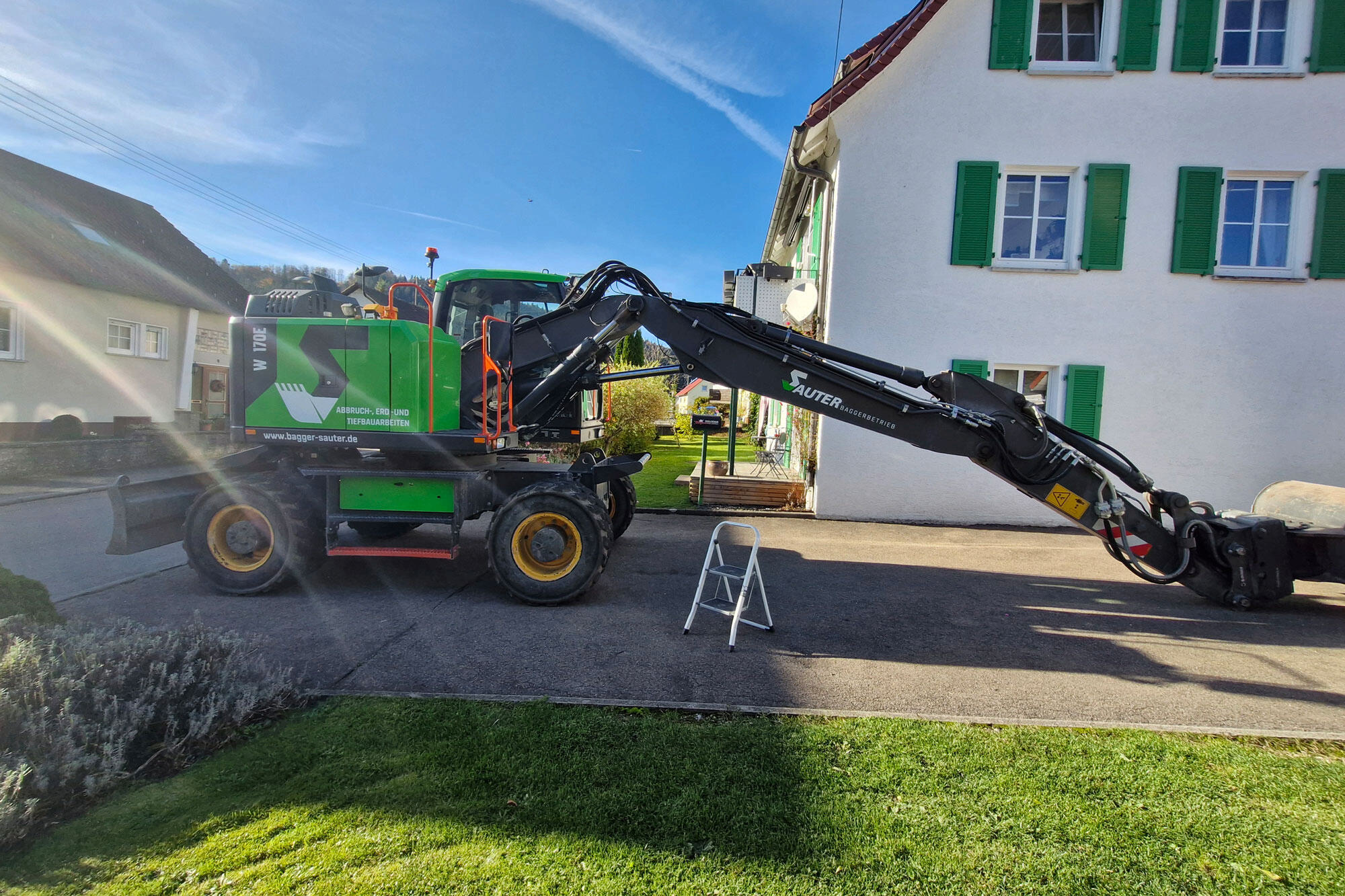 Fahrzeugbeschriftung Bagger